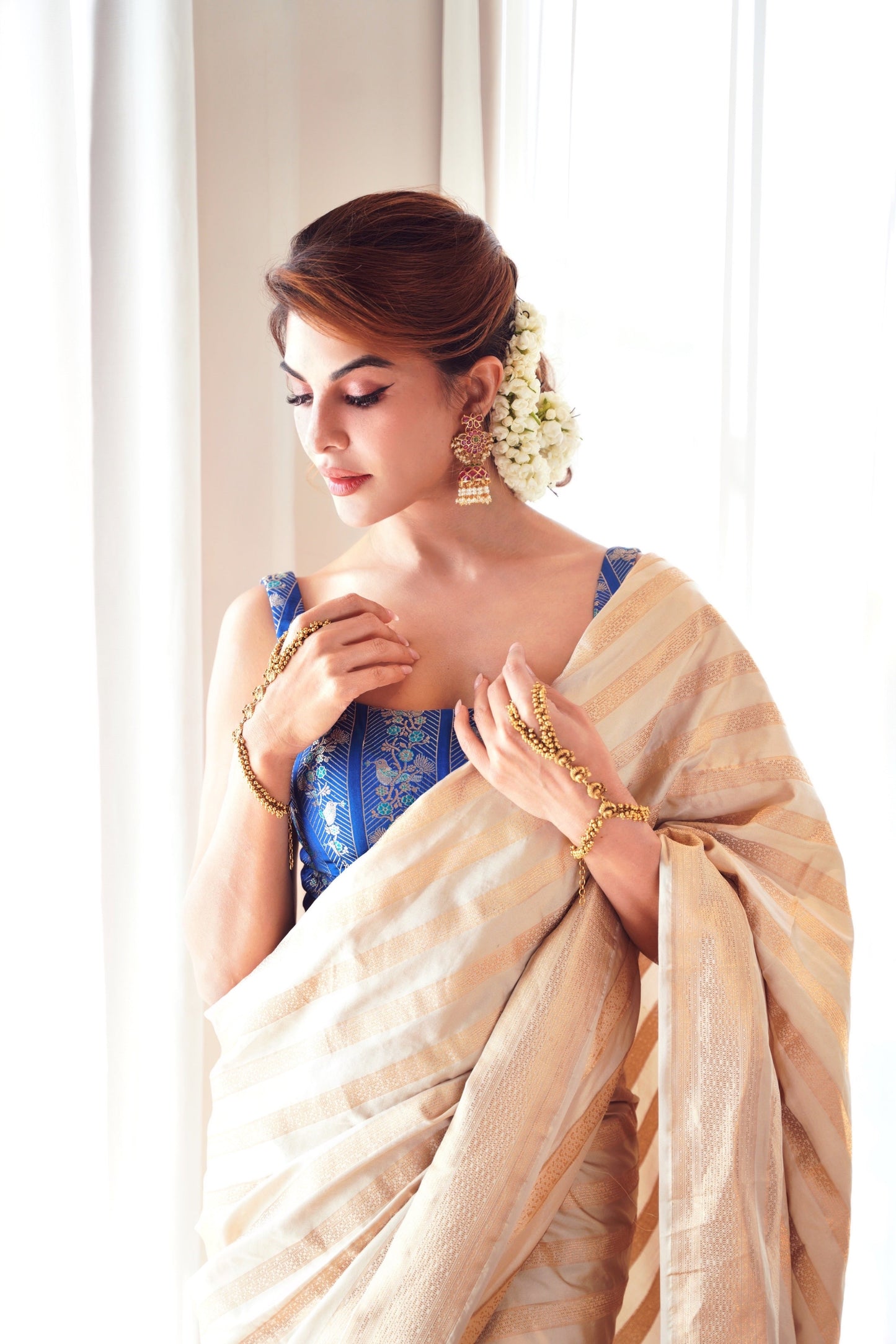 Jacqueline Fernandez in Handwoven Beige Silk Sari
