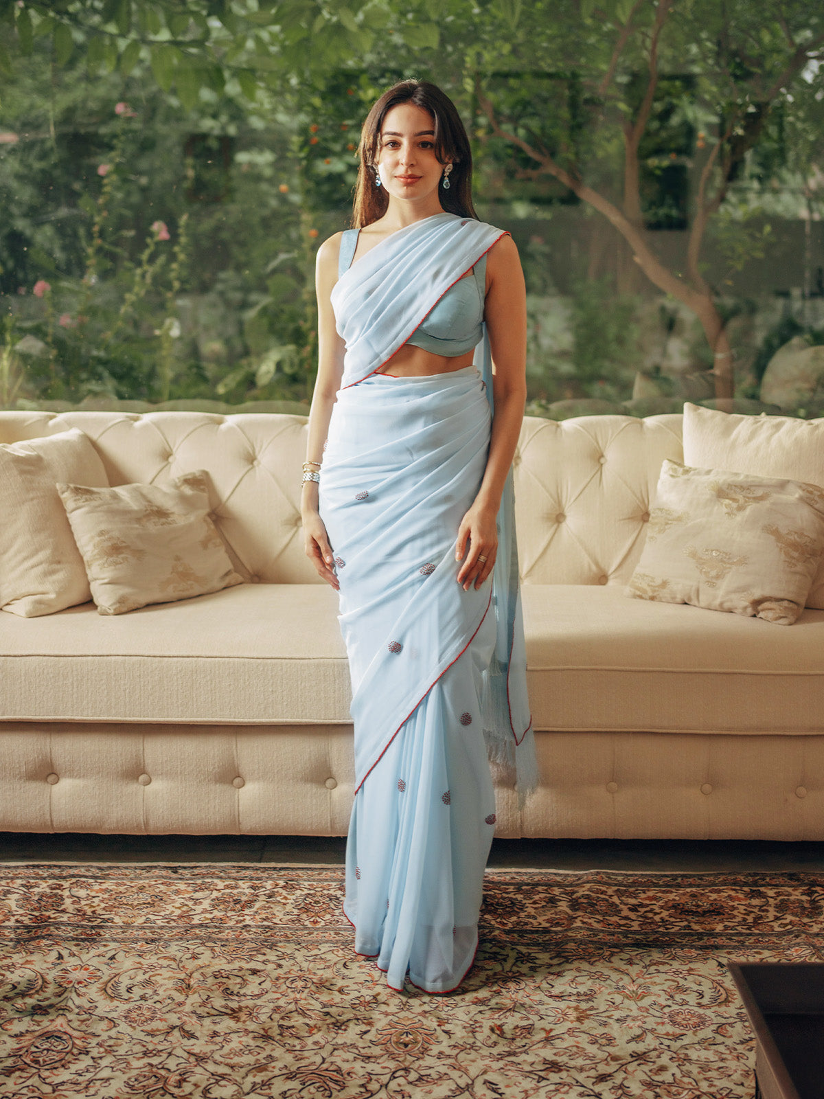 Handwoven Ice Blue Georgette Embroidered Saree