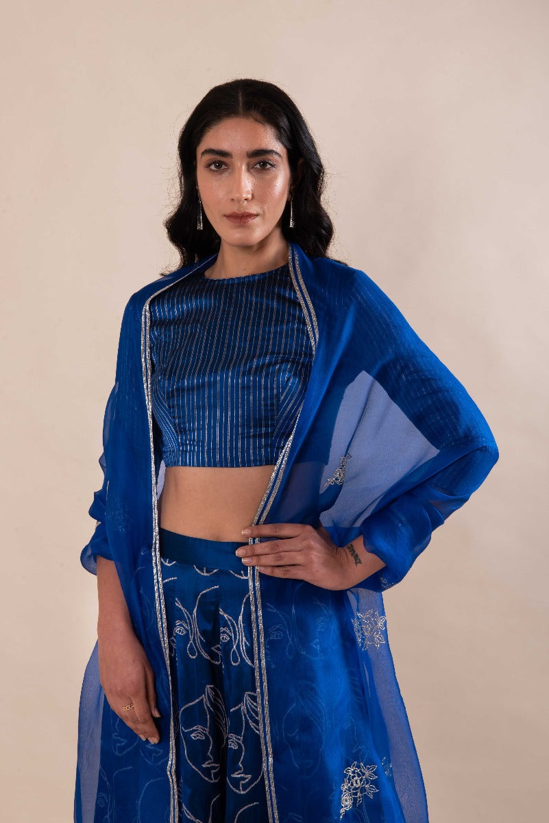 Handwoven Blue Silk Abstract Faces Lehenga