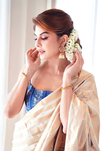Jacqueline Fernandez in Handwoven Beige Silk Sari